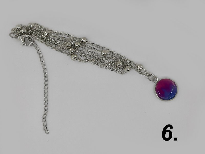 %231185 set collana/orecchini bisessuale