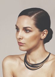 Blue and gold necklace with a sleek, modern design. Made of high-quality materials for a stylish and durable accessory.