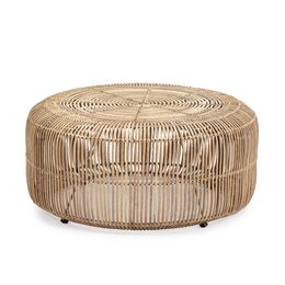 A round, woven ottoman or footstool made of metal and washed white wicker. The piece has a diameter of 84 cm and a height of 37 cm, making it a large, comfortable seating option.