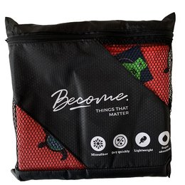 Quick dry towel with turtles design, made of lightweight, absorbent material.