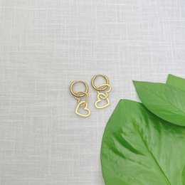 Gold-tone dangling heart-shaped hoop earrings