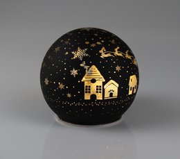 A black glass ball with a glowing house and stars, suitable for Christmas lighting.