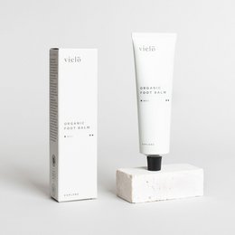 Organic foot balm in a 50ml tube, designed to nourish and moisturize feet. Contains natural ingredients.