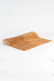  Rectangular gold-colored hand-tufted 100% cotton bath mat.
