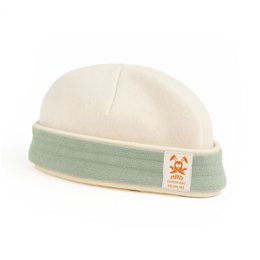Soft, organic cotton newborn hat in a classic white and mint green color scheme, featuring a small orange logo patch for a stylish touch.