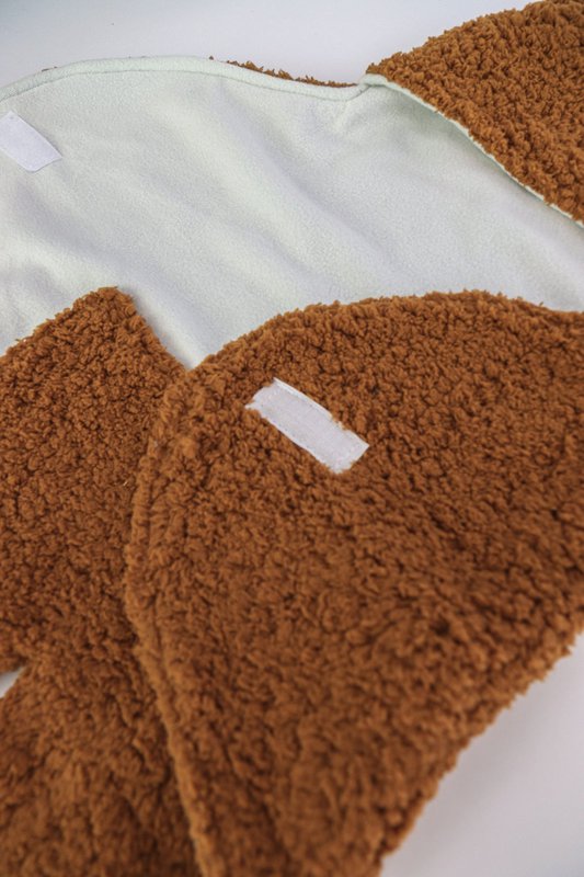 Couverture d'emmaillotage en peluche