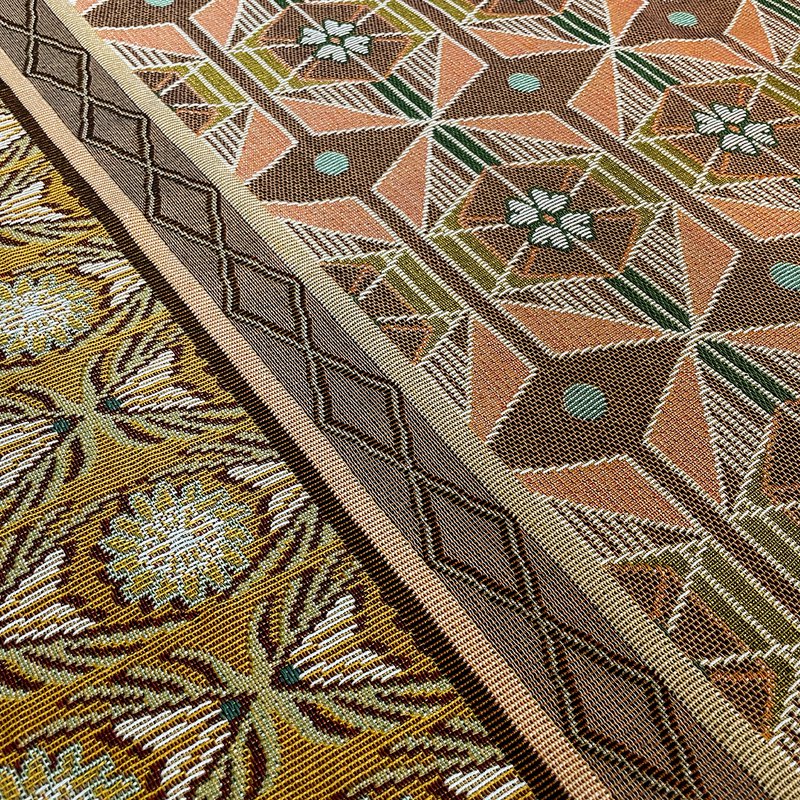 NIN-NIT | Couverture Nouveaux Classiques | plaid | couverture tissée | couvre-lit | 100% coton tissé | Fleurs | feuilles | imprimé nature graphique | marron | orange | beige | lilas | bleu | vert | violet | rose | 220x160cm