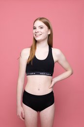  Black sports bra top, sleeveless, teen fitness wear, soft material, minimalist design