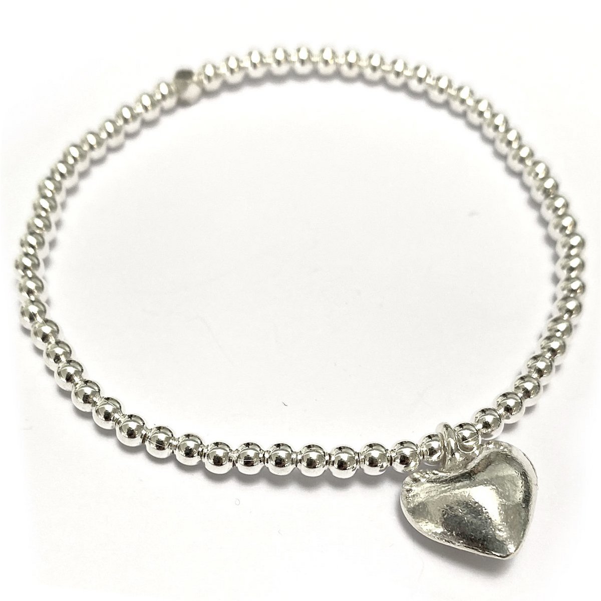 Pulsera Compasión Plata