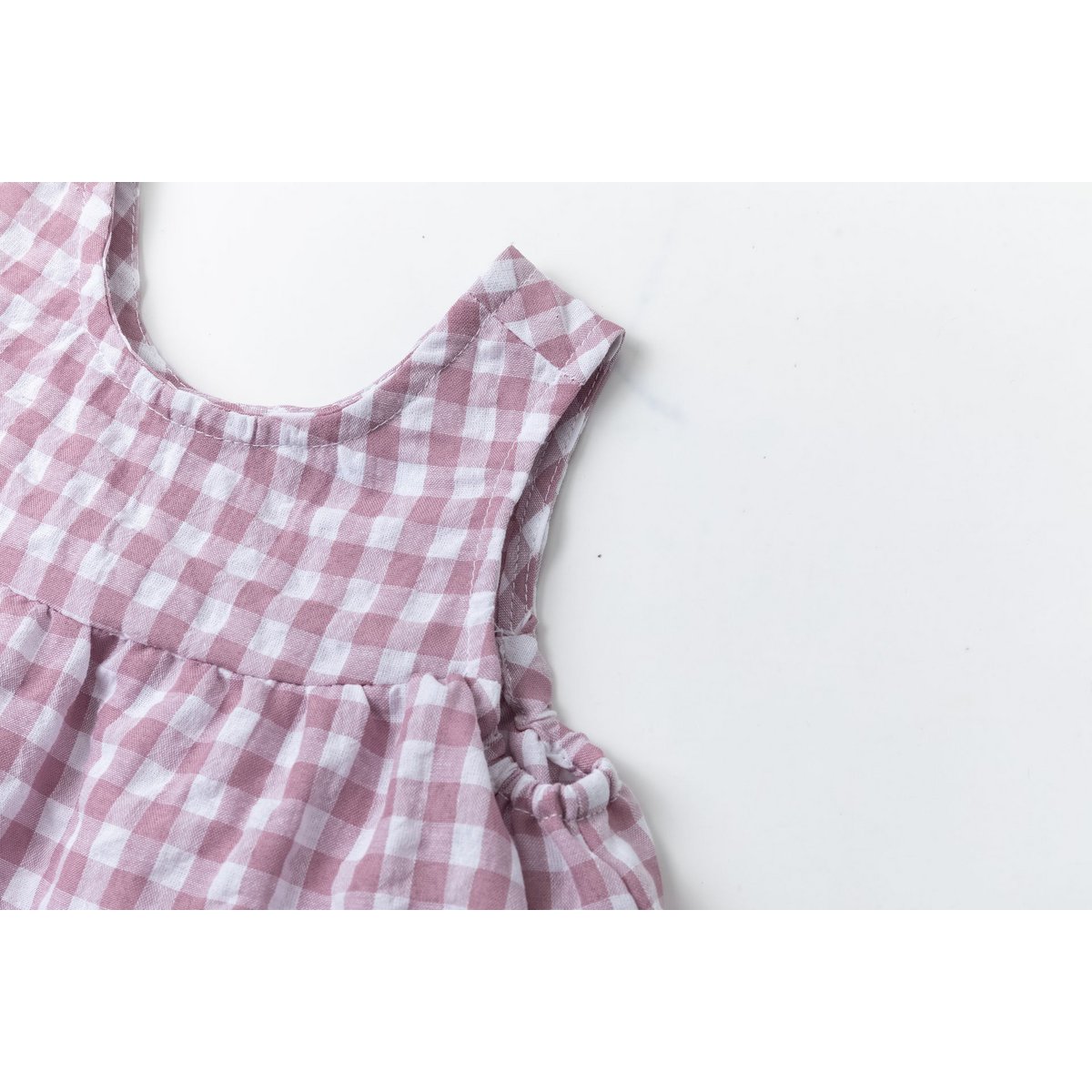 Blusa baby con stampa vichy malva e volant BGV96544