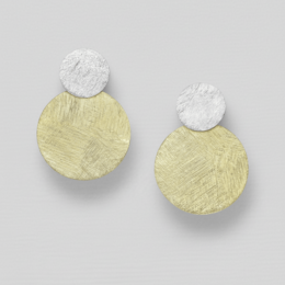 Sterling silver and gold plated drop earrings with a round, textured design.