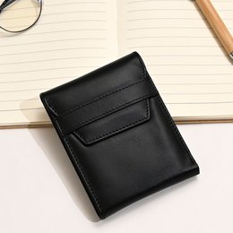 Black leather wallet with coin pocket and 6 card slots, elegant slim bifold design.