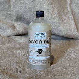 Organic black soap in 1L bottles, a natural all-purpose cleaner made with plant-based ingredients.