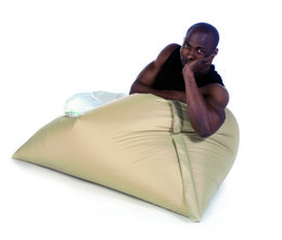 Oversized beige bean bag chair with a relaxed, casual style.