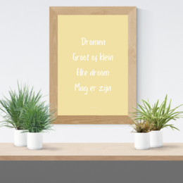 Poster with inspirational quote "Dreams are not what you see in your sleep, but what keeps you awake" in a simple, minimalist frame.