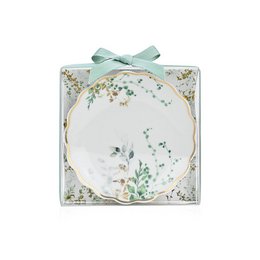 "White porcelain round jewelry box with delicate green floral design, gold accents, and mint green ribbon bow"