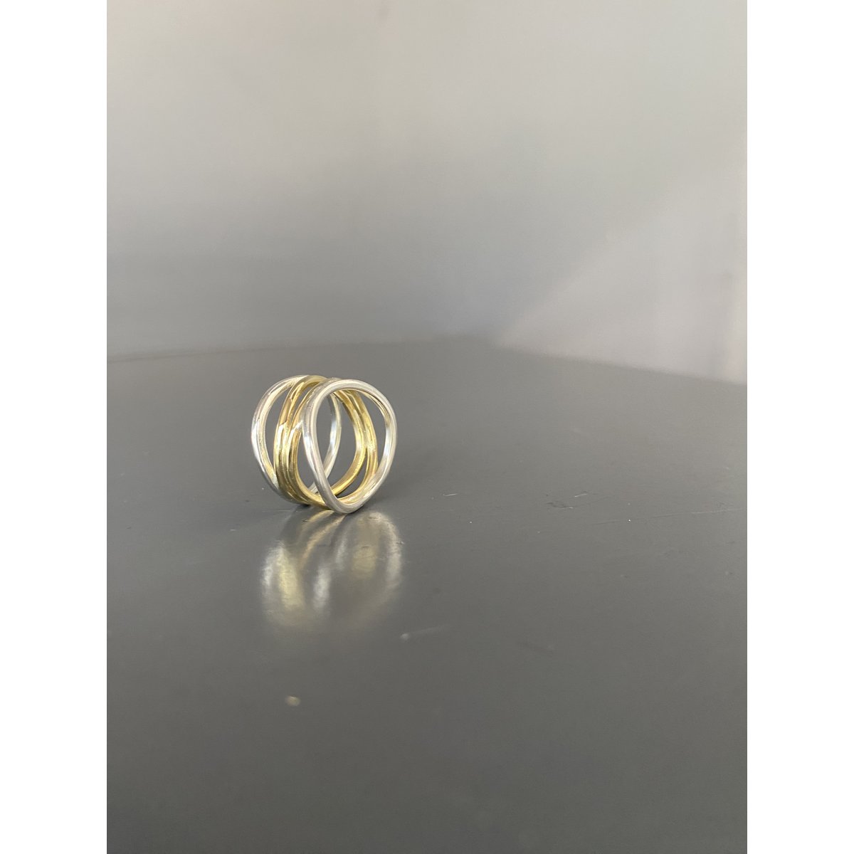 Wave ring in silver and brass