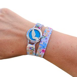 Silver-toned charm bracelet with "Mama" charm and floral fabric strap