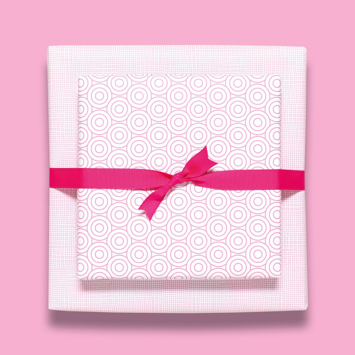 Papier d'emballage rose géométriquement avec des cercles, du papier d'emballage graphique en rose tendre pour des cadeaux de naissance, du baptême ou comme papier d'emballage pour l'anniversaire des enfants