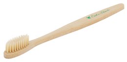 Bamboo toothbrush with natural bristles, eco-friendly and sustainable dental care.