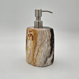  Petrified wood soap dispenser with a natural, rustic appearance. Made of durable petrified wood with a stainless steel pump. Suitable for bathroom or kitchen use.