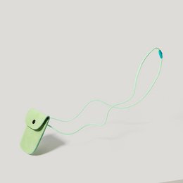 Mint green leather pouch with adjustable strap for kids' backpacks.