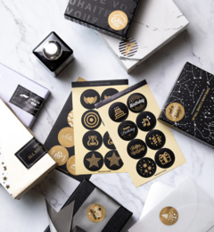 A set of 32 black and gold stickers, including congratulation, closing, gift, and festive sealing stamps, suitable for wrapping and packaging.