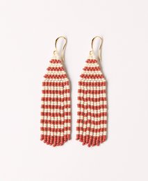 Beaded statement earrings in a striped pattern of red and white. The earrings have a long, tassel-like design.