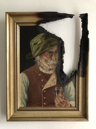 Framed painting of an elderly man with a green hat and beard, wearing a red jacket. The painting has a dark, vintage aesthetic.