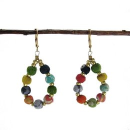 Colorful beaded teardrop earrings with a mix of green, blue, and red stones.