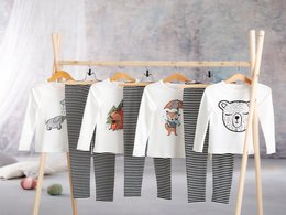 Unisex children's pajamas top with forest animal designs including a dreamer fox, lovely squirrel, friendly elephant, and sleepy bear. Available in sizes 5-6, 7-8, 9-10, and 11-12.
