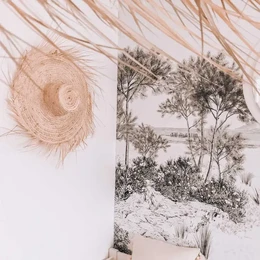  Frayed straw hat with inimitable summer style. Beige, textured straw hat with a wide brim and natural, organic appearance. Ideal for warm weather and outdoor activities.