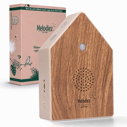  The product is a Melodiez Deluxe - Box Incl. Batteries and 5 Natural Bird, Ocean, Cricket and Jungle sounds - Bird Sound House with Sensor. It comes in three variants: Oak Harmony, Lavender Dawn, and Forest Light. The product is categorized as a Statue.

The key details that can be extracted from the images and product information are:

Colors: Oak, lavender, forest green
Materials: Wood
Style: Birdhouse-shaped with natural motifs
Shape: Rectangular, house-like

This product appears to be a decorative wooden birdhouse that plays natural sounds like bird calls, ocean waves, and jungle noises. The different variants feature varying wood tones and nature-inspired designs. This information would be relevant for a semantic search related to nature-themed home decor or sound machines.