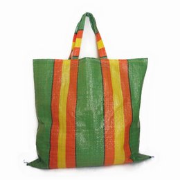 Large green reusable shopping bag with colorful vertical stripes in orange, yellow, and red.
