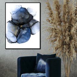 A large, abstract floral print in shades of blue and black, framed and displayed on a wall. The print features a striking, textured design that resembles a blooming flower or organic shape.