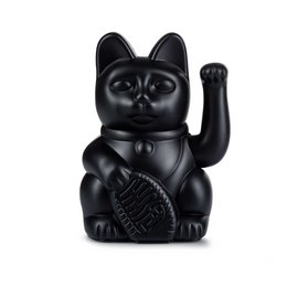 A black, ceramic figurine of a lucky cat with a raised paw. The cat has a stylized, minimalist design and appears to be made of a glossy, black material.