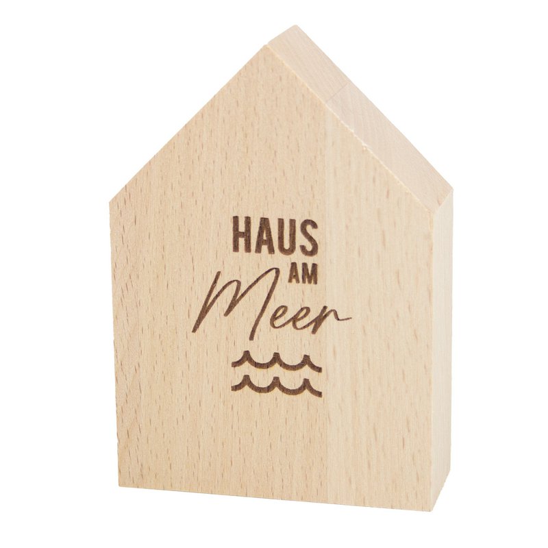 Large decorative wooden house by the sea made of sustainable beech wood