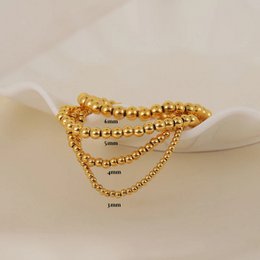 Aquilea – Armbandstapel aus Goldperlen