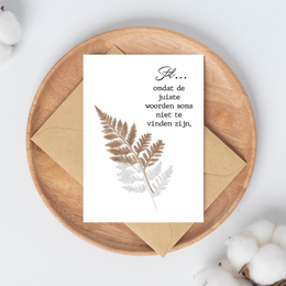 Elegant condolence card with a serene fern design and a thoughtful Dutch message, conveying sympathy and comfort during a time of loss.
