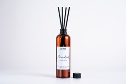 Refillable diffuser pack with 7 scents - Cassis & Fig, Grapefruit & Gardenia, Lime, Amber, Velvet Rose & Oud, Peonies & Pink Pepper, Vanilla & White Musk. Amber glass bottle with black reed diffuser sticks.
