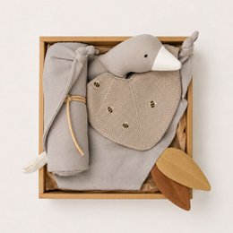 Soft, plush cuddle cloth in shades of blushing rose, featuring a rabbit-shaped design. Includes a matching blanket for cozy comfort.