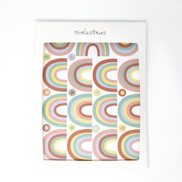 Multicolor, pastel blue, pastel mint, pastel pink, and sunset-colored decorative vinyl wall mural with abstract rainbow patterns, suitable for a kids' room.