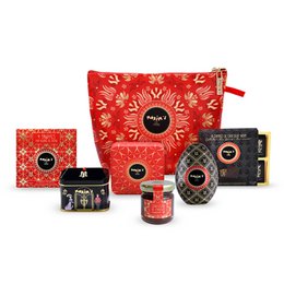 A luxurious chocolate gift set featuring a variety of premium chocolate products in a vibrant red and gold packaging design. Includes a selection of truffles, chocolate bars, and other confections.
