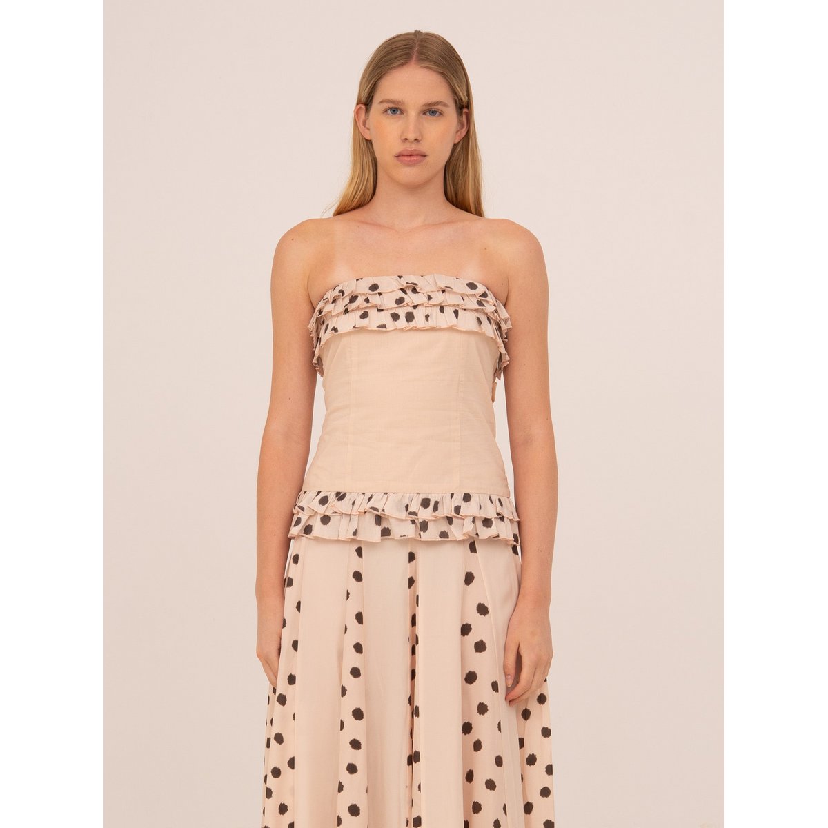 Noctis beige top met stippenprint