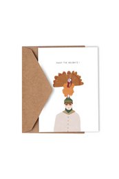 A festive holiday card featuring a whimsical illustration of a turkey wearing a chef's hat and holding a spatula. The text reads "ENJOY THE HOLIDAYS" in a playful font. The card is made of high-quality materials and comes with a kraft paper envelope.