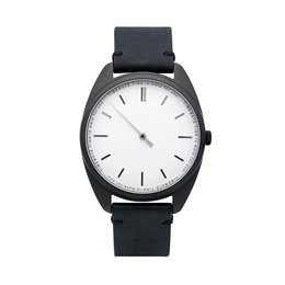 A sleek, minimalist black and white watch with a simple, modern design. The watch features a round face with a clean, minimalist dial and a black leather strap.