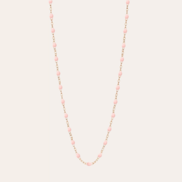  Pale pink and gold resin necklace with a delicate chain.