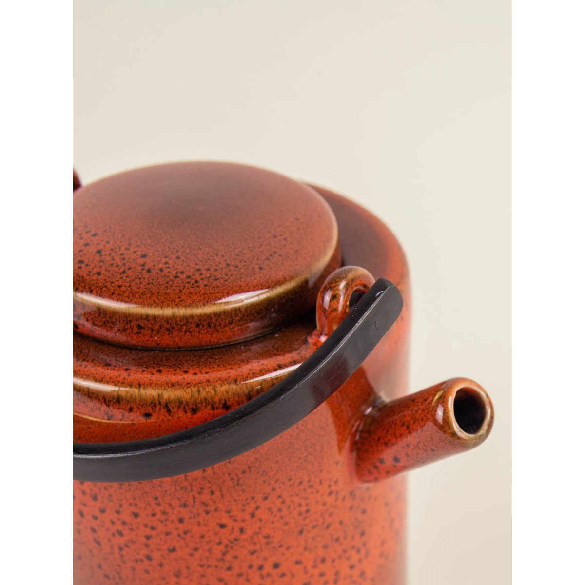 Laterite teapot by Hoa Bien with black brass handle