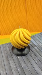 Spiral ball shaped beeswax and soy candle