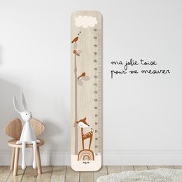 Decorative wall thermometer with whimsical forest animal illustrations, perfect for a child's room. Features a wooden frame and measures temperature in Celsius and Fahrenheit.